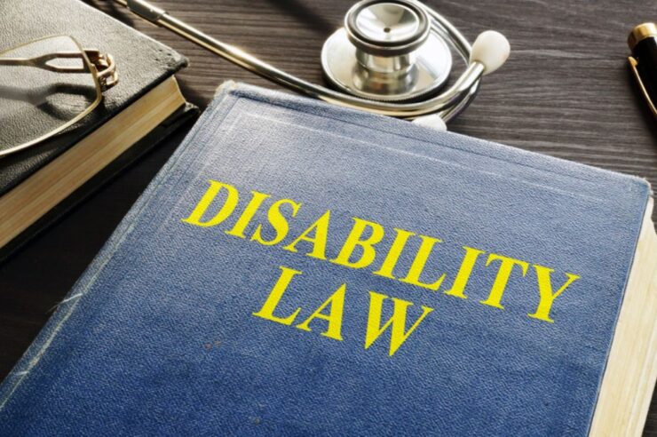 Disability law book on desk.